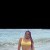 latina en bañador con trenzas busca nuevos amigos
